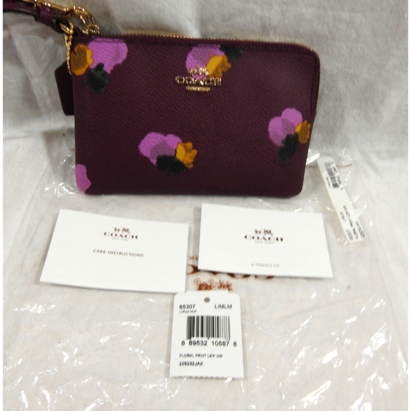 Coach Handbags - NEW Coach Floral Print Plum Multi Wristlet